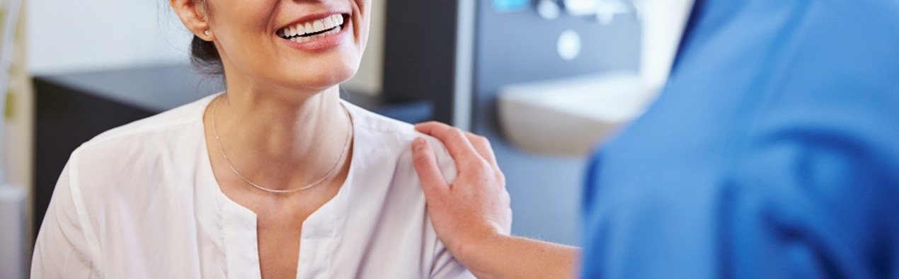 Patient smiling at nurse